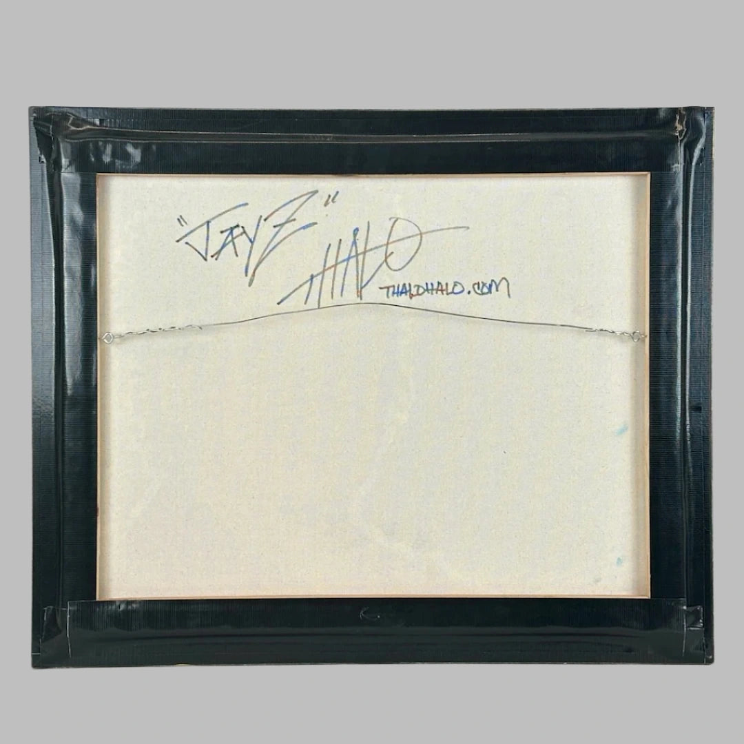 Back of framed art showing artist signature in at top center of canvas. Frame hangs by wire.