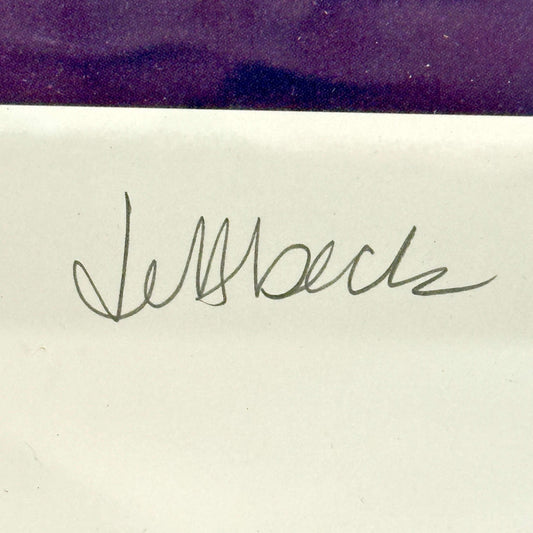 Penciled Jeff Beck signature at corner of print.