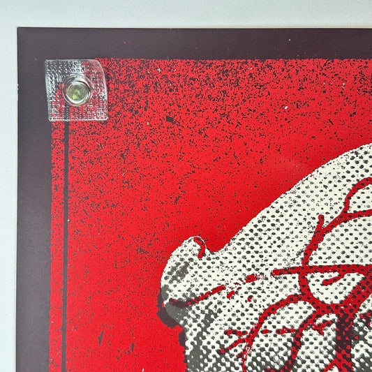 Top left corner showing no damage to corner or edges of poster.