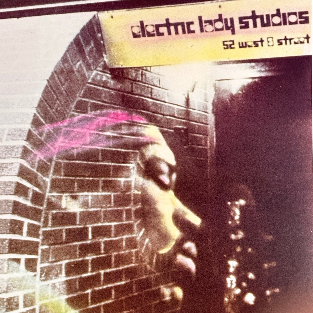 Close up of Jimi Hendrix's face and Electric Lady Studios sign