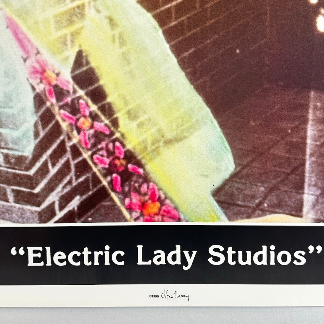 Bottom banner of poster with "Electric Lady Studios" in white print on black banner, copyright info beneath.