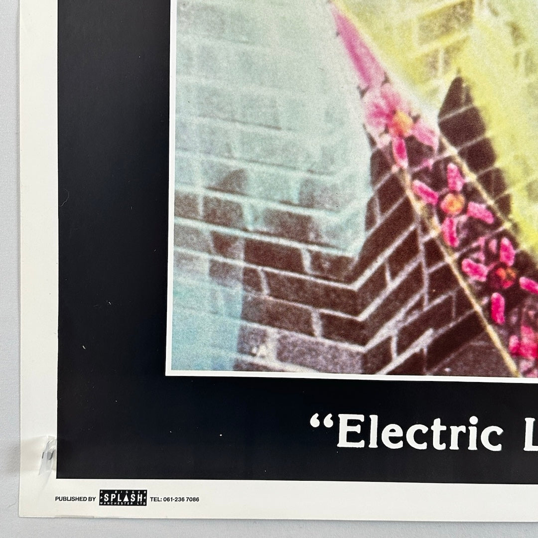 Bottom left corner with crisp edges and slight edge bump under publishing info.