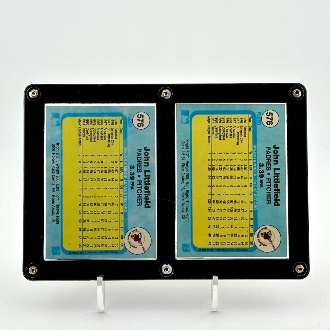 Backside of cards, identical and showing player statistics.