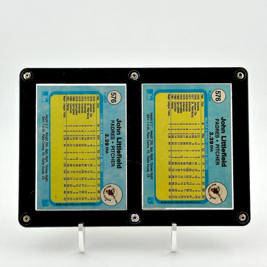 Backside of cards, identical and showing player statistics.