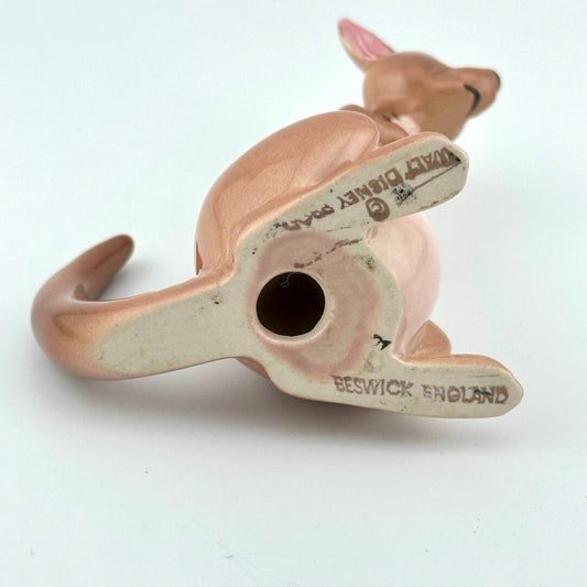 A vintage ceramic Disney kangaroo figurine shown from underneath on a plain white background.