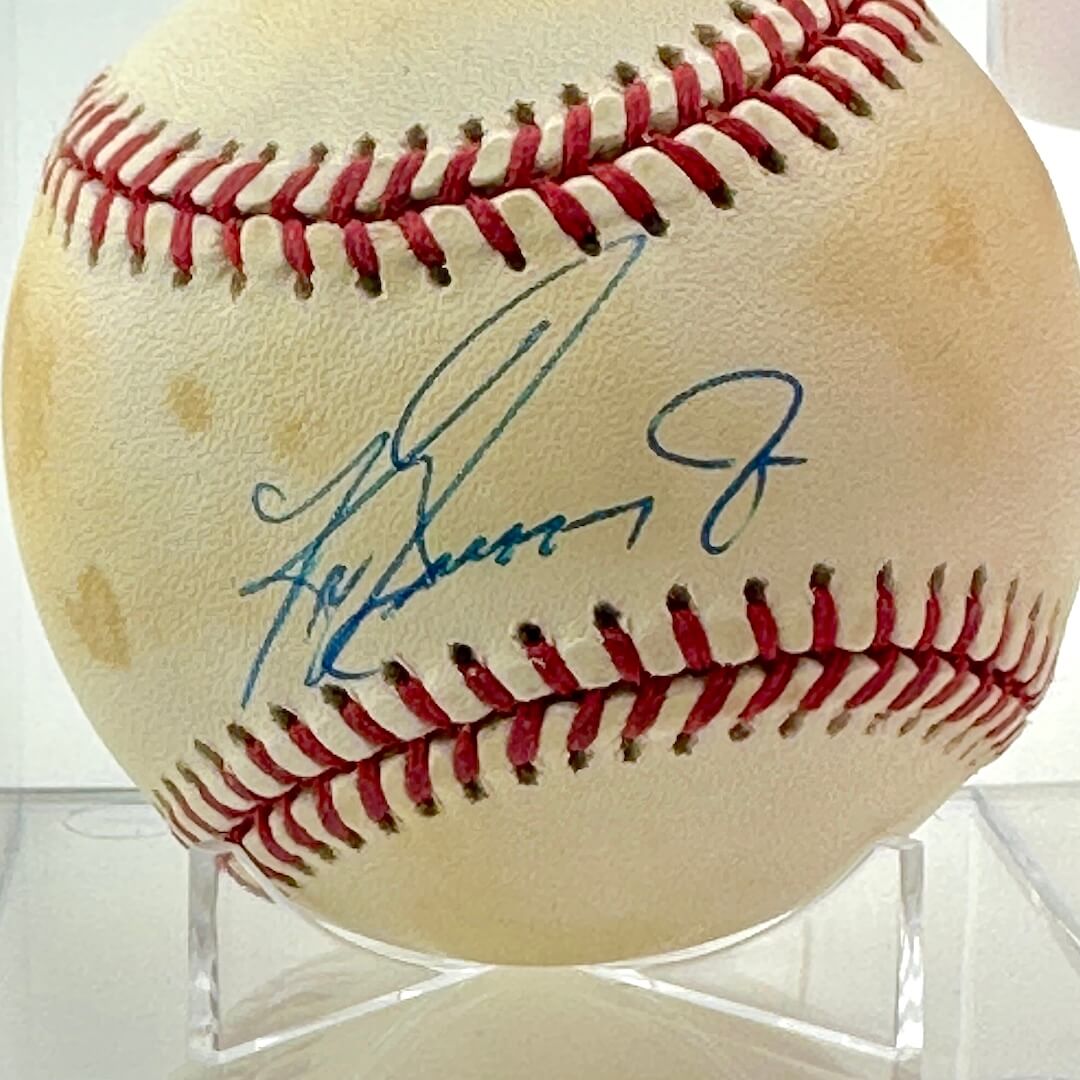 Close up of blue pen signature across sweet spot.