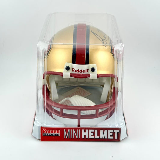Riddell mini football helmet in clear packaging on a white background