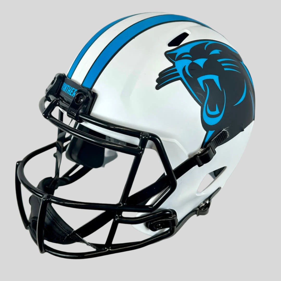White full size replica american football helmet with blue/black panther logo on side, under white/blue stripes own center.