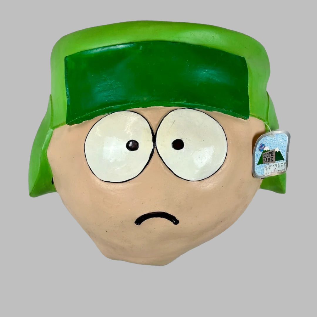 Front of mask showing Kyle's sad face, no opening for the mouth, and the original tag.