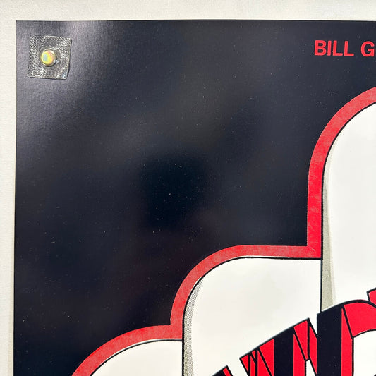 Top left corner of poster with crisp corner and clean edges, in mint condition.