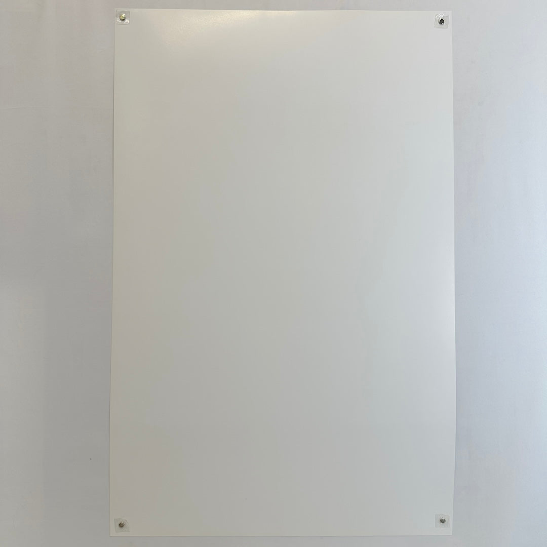 Backside of white poster showing zero damage and pristine condition.