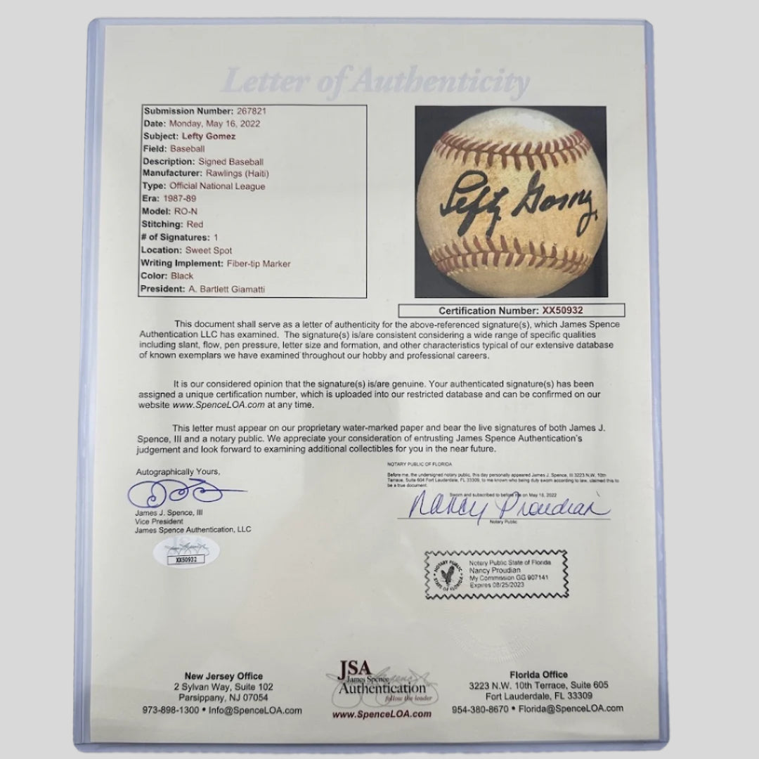 Letter of authenticity in clear protective sleeve. Details regarding signature placement, type & genuine nature