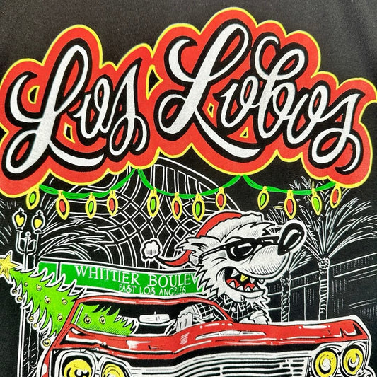 Close up of main graphic and artist name in cursive printed above it.