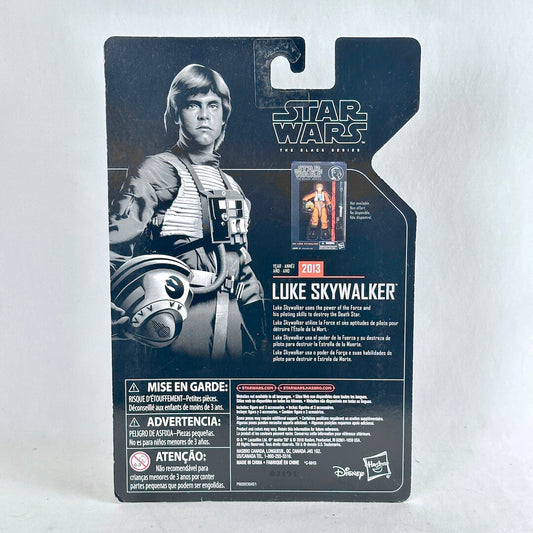 Back of a Star Wars The Black Series Luke Skywalker action figure package, showing character art, & product name.