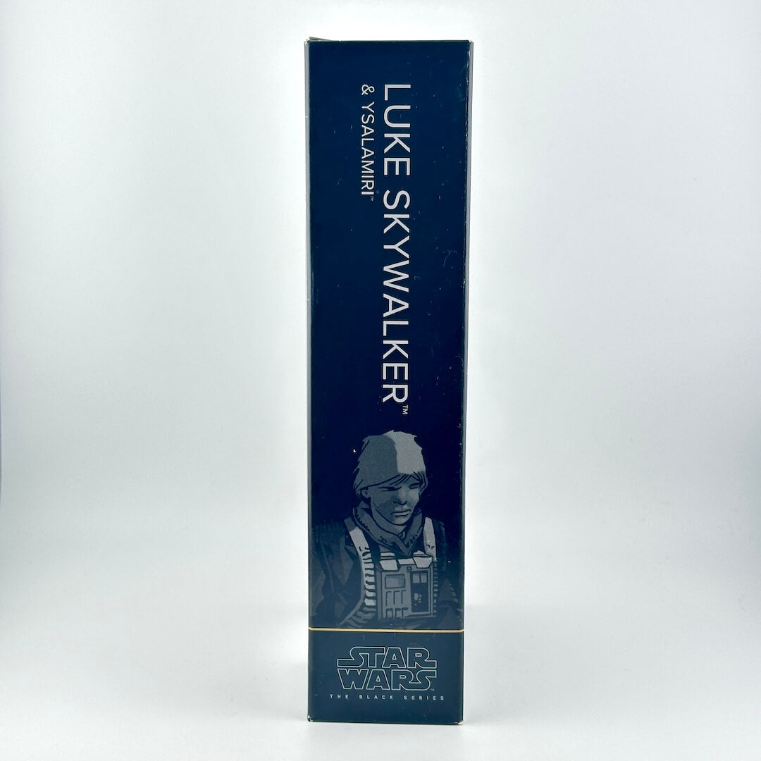Side view of action figure packaging showing character name and Star Wars branding.