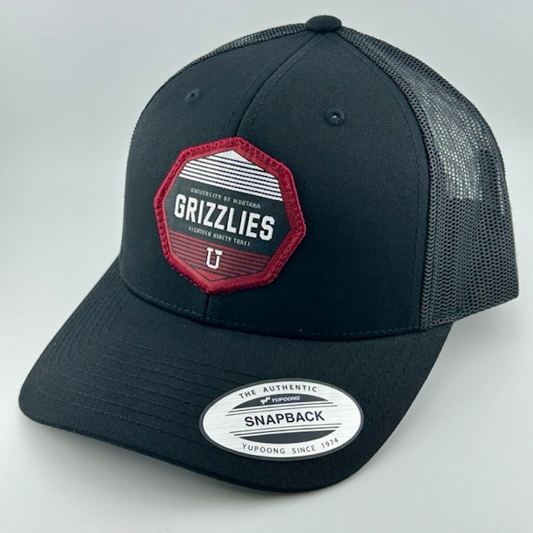 Baseball cap with black face, black brim & plastic mesh back. Maroon, white & black Montana Grizzlies logo center-face.