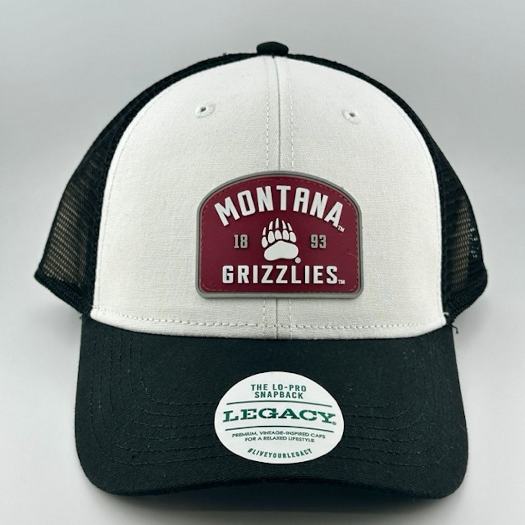 Baseball cap with white face, black brim & plastic mesh back. Maroon & white Montana Grizzlies logo center-face.