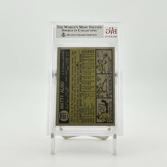 Plastic encased baseball card on cream cardstock, black text with player stats, comic along one side.