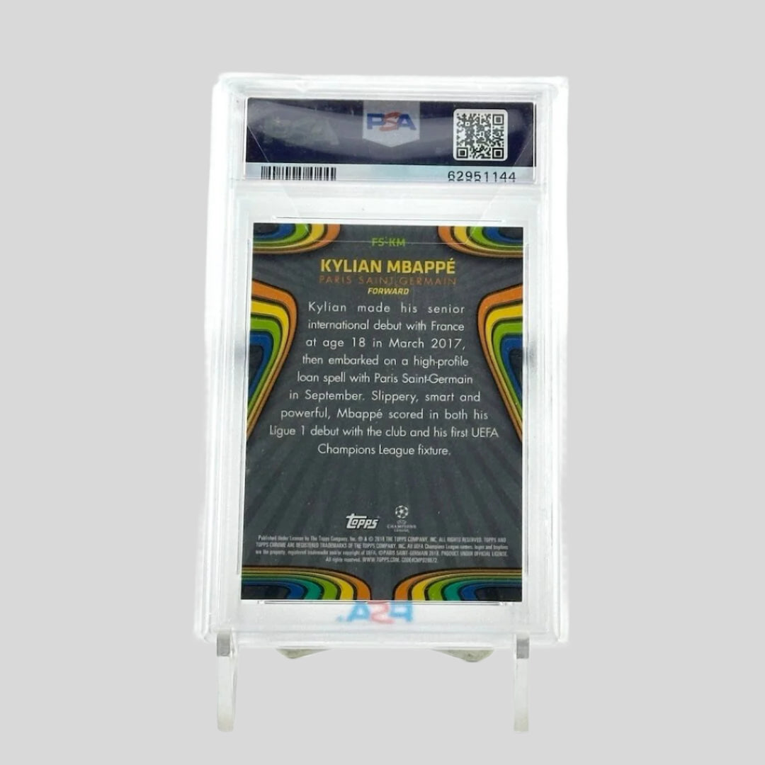 Back of plastic encased graded sports card. Top of case has QR & barcode, card face is grey with rainbow border, white text.