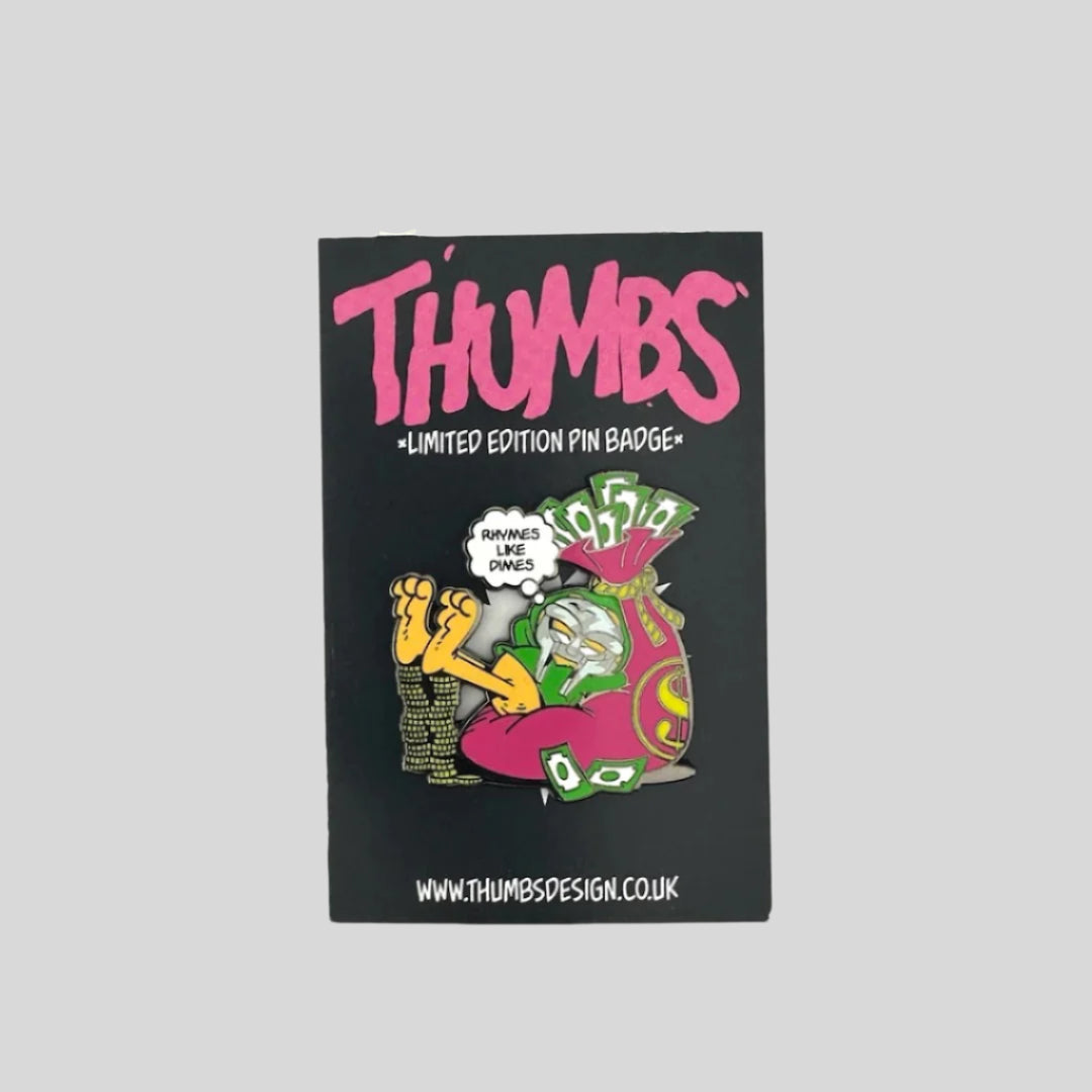 Garfield cat dressed as MF DOOM lounging on pink money bag, feet propped on coin stacks. Thought bubble, ”Rhymes like Dimes"