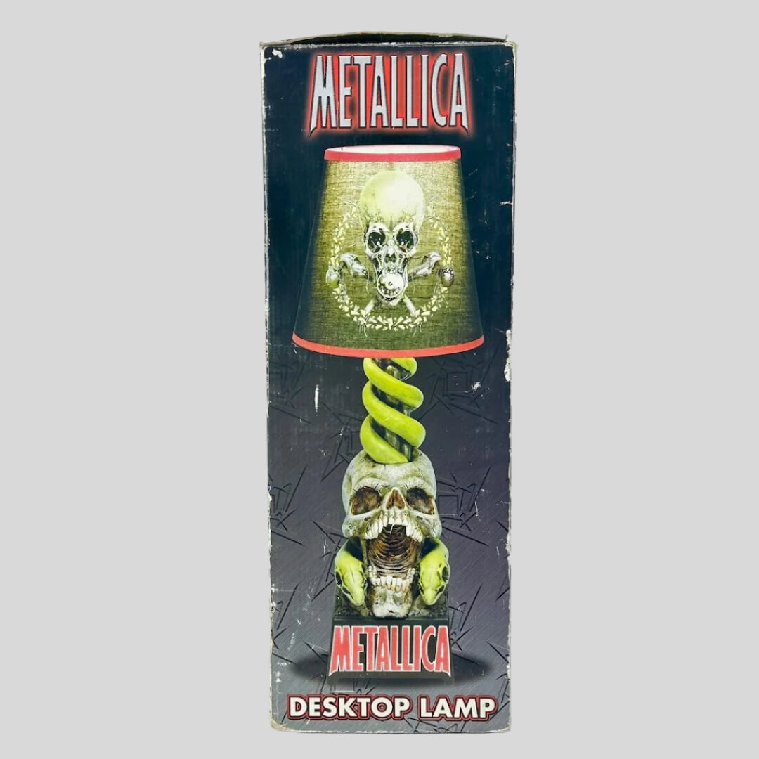 Metallica desktop lamp packaging with skull design and green spiral