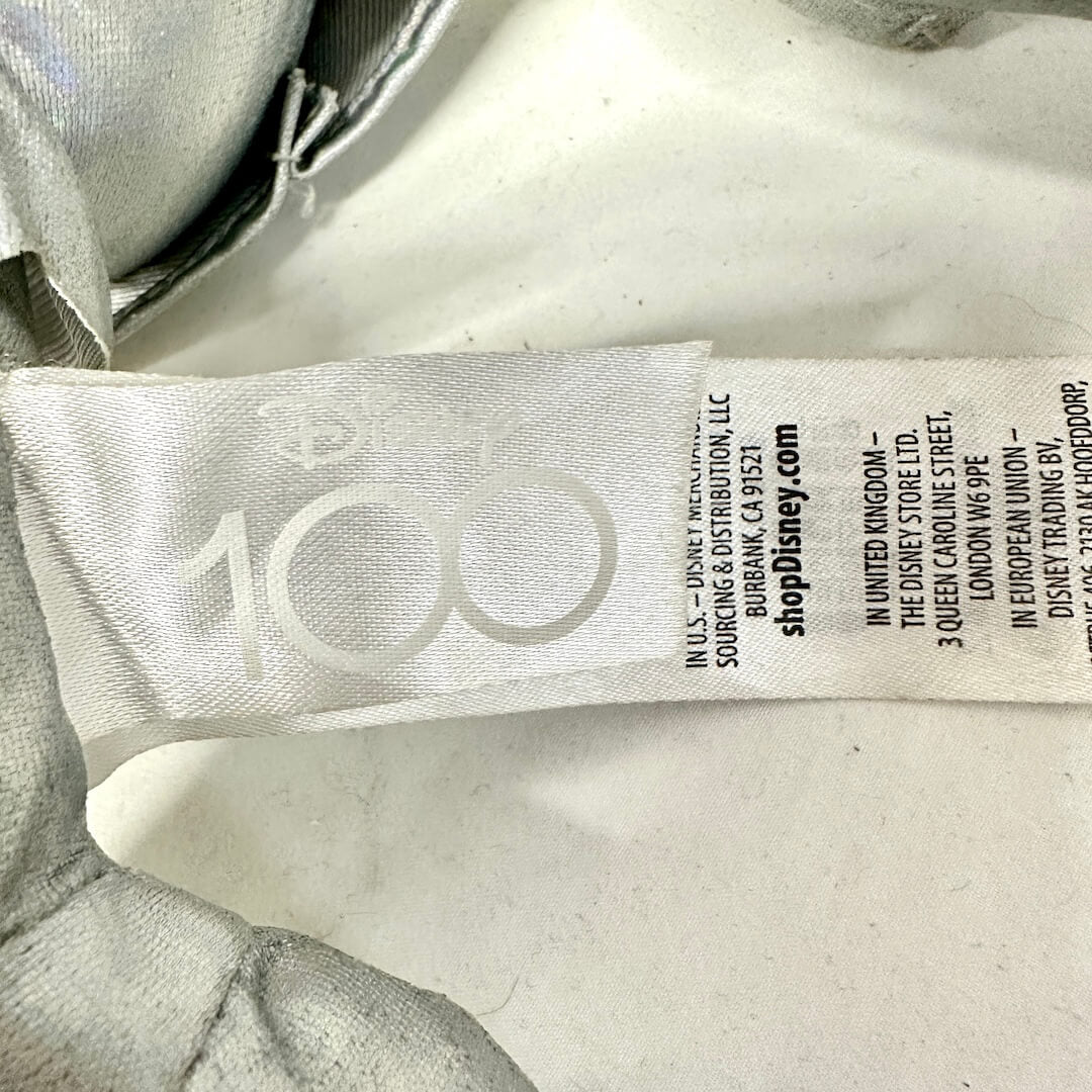 Close-up of tag showing Disney branding.