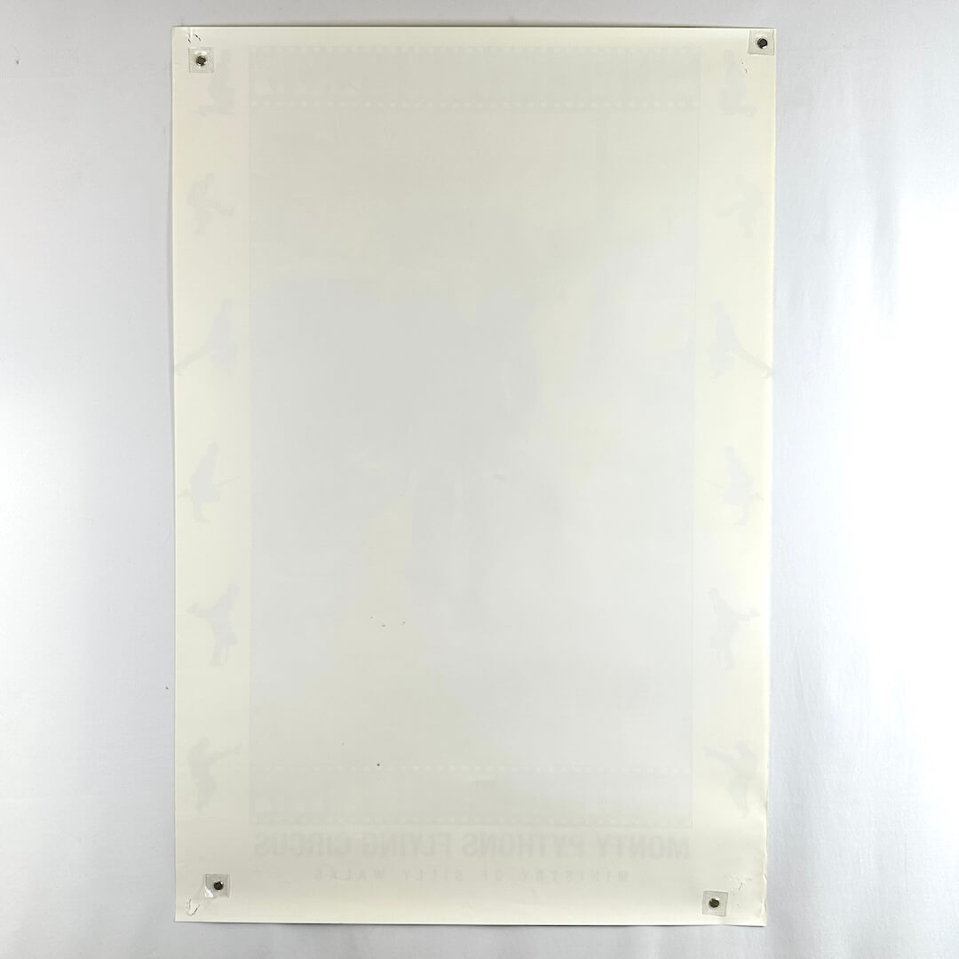 Backside of poster showing no damage to face and some edge wear throughout.