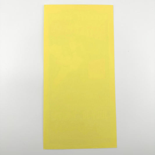 Yellow rectangular paper on a white background