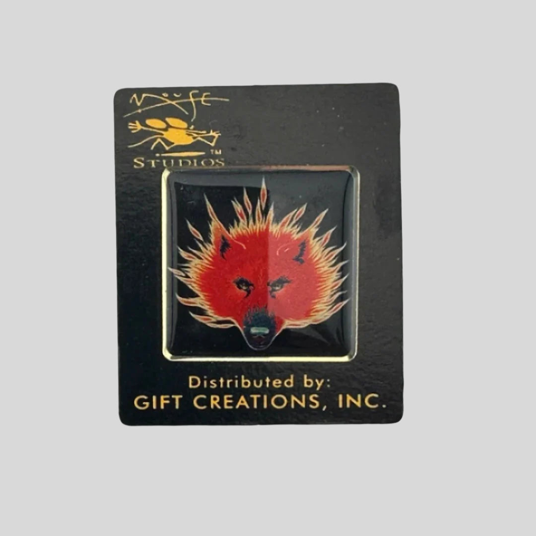 Hard enamel pin with flaming red wolf face in center. Black background.
