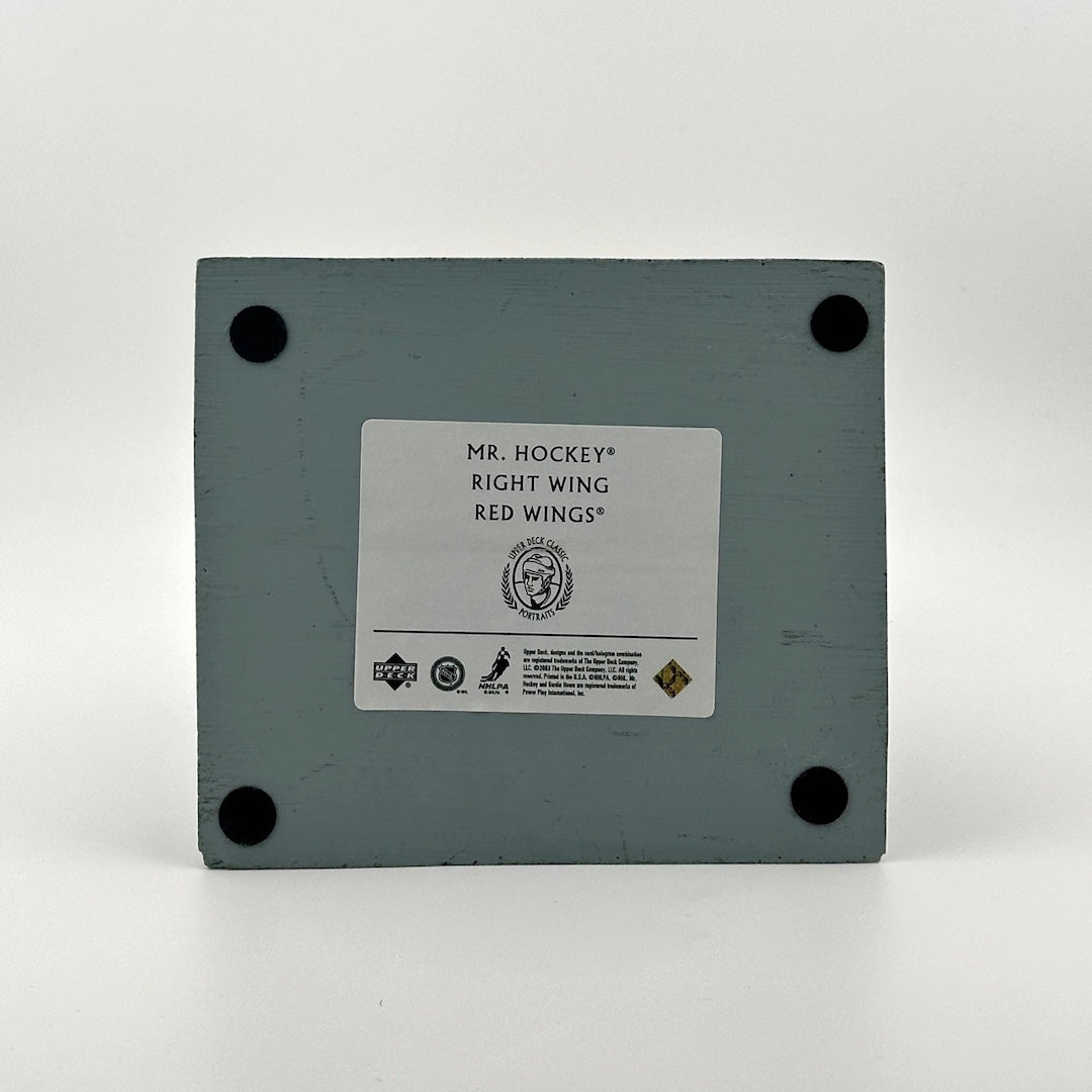 Bottom of pedestal with information sticker for player and manufacturer.