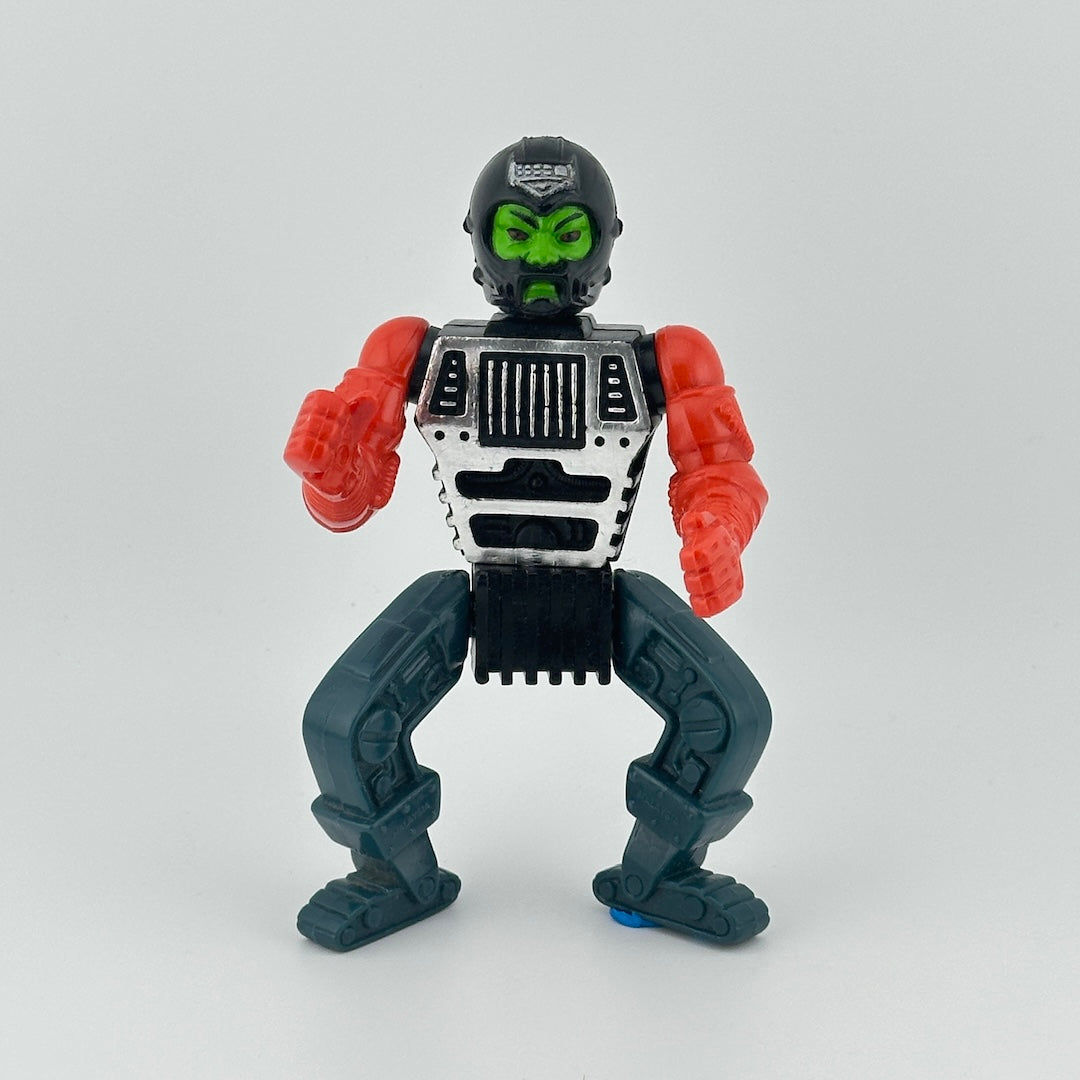 Robotic figure with red arms, blue legs, black waist, silver chest, black helmet, with green face.