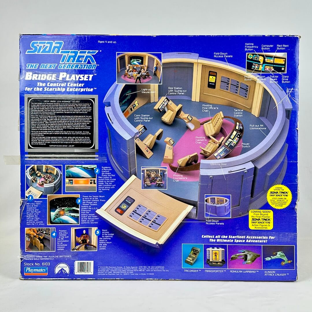 Boxed Star Trek bridge playset with detailed illustrations on a gray background