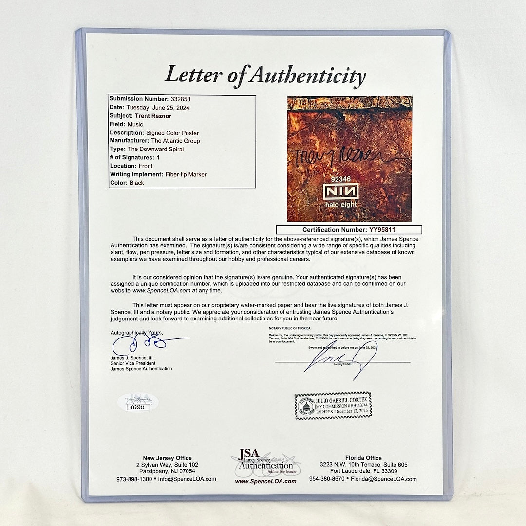 Letter of Authenticity for poster in protective sleeve against white background. "YY95811" authentication number.