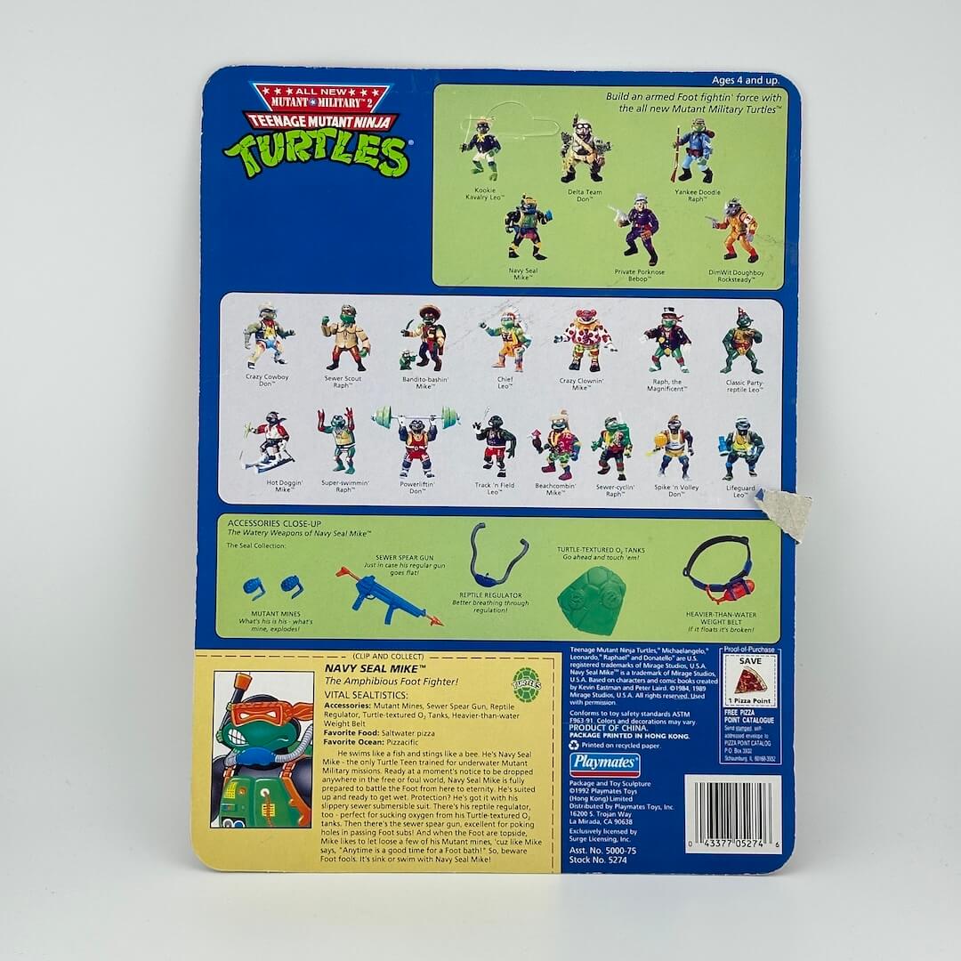 Cardboard backing picturing other character figures available, character portrait, & manufacturing & copyright information.