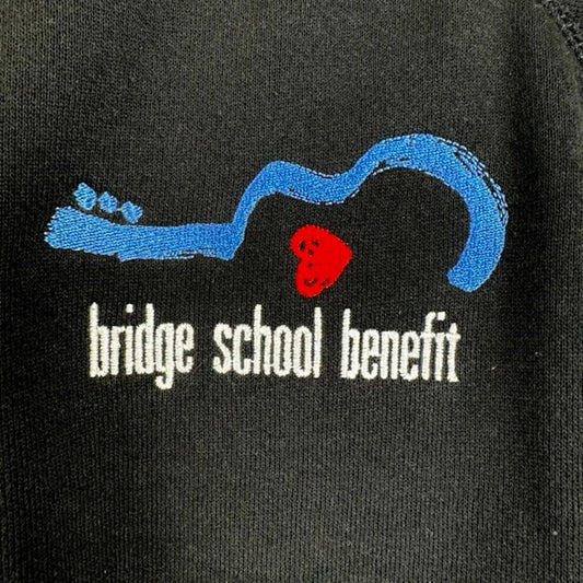 Close up of breast embroidered logo.