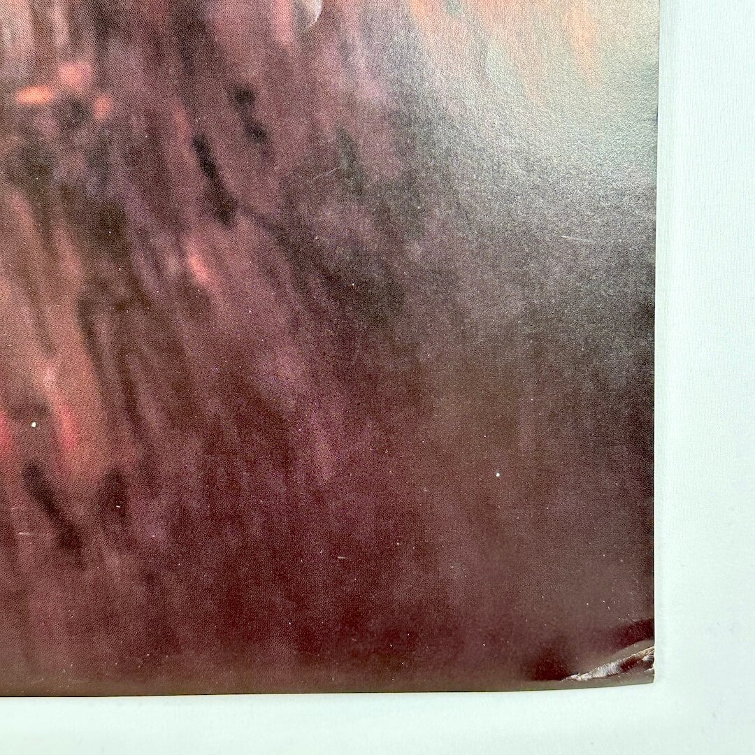 Bottom right corner with a crease.