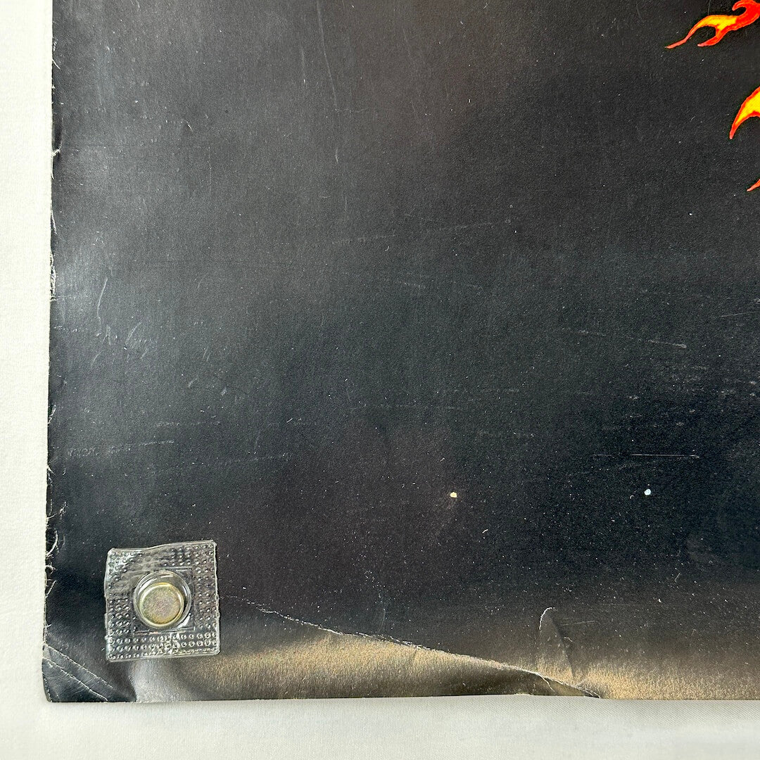 Bottom left corner of poster with edge wear and crease to corner.