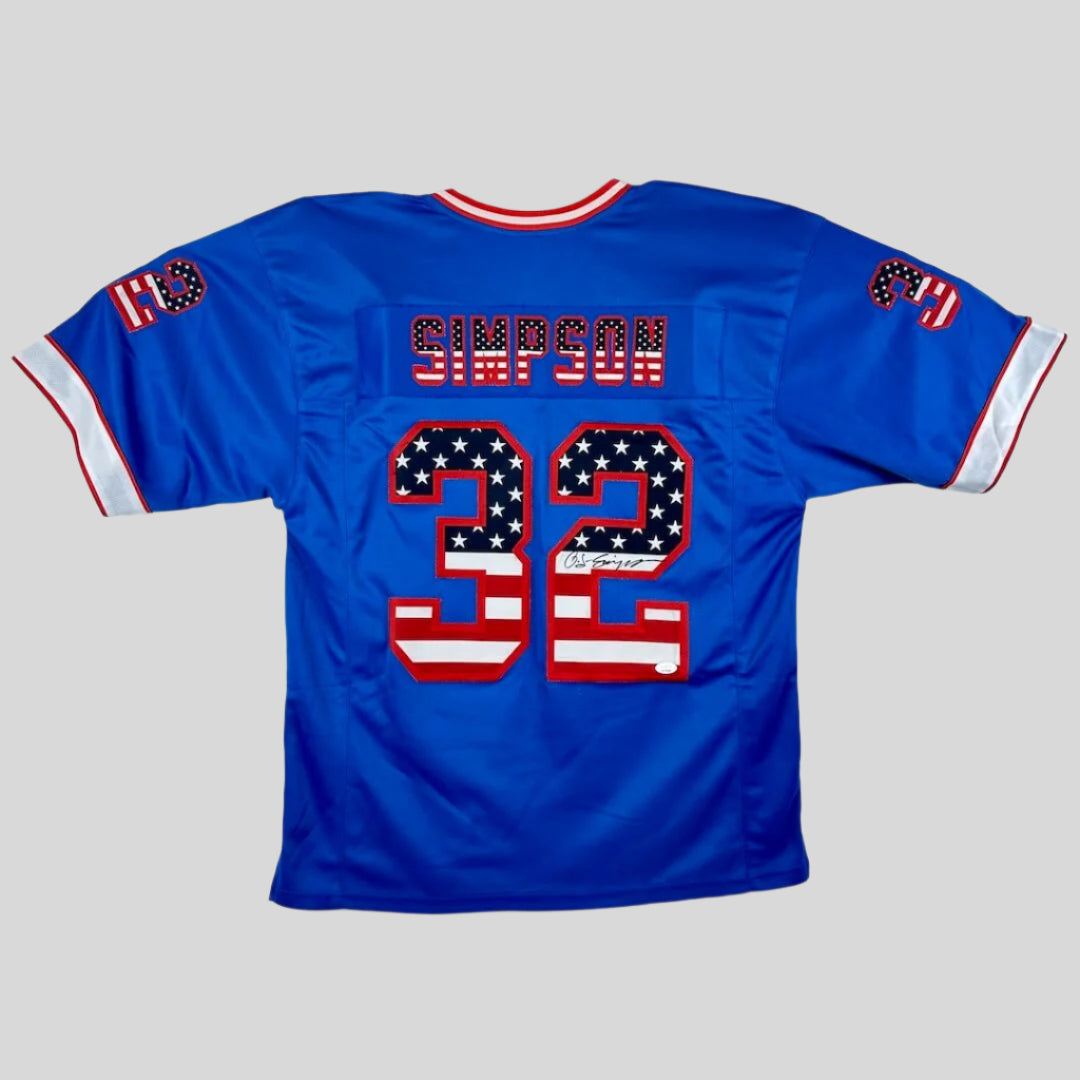 Blue baseball jersey with 'SIMPSON 32' printed on a white background