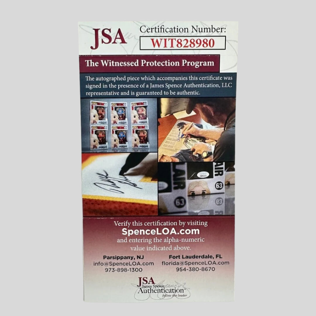 JSA certification card for witnessed protection program on a light gray background