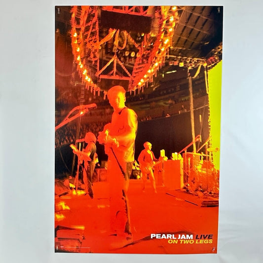 Poster of a concert with 'Pearl Jam Live on Two Legs' text.