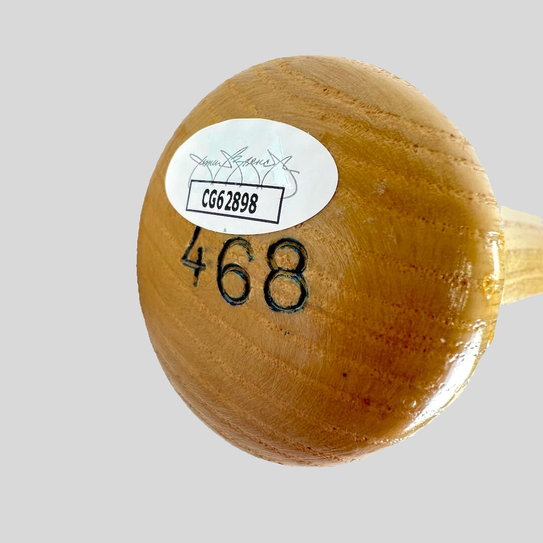 Baseball bat knob with '468' burned in and JSA authentication sticker with number 'CG62898'