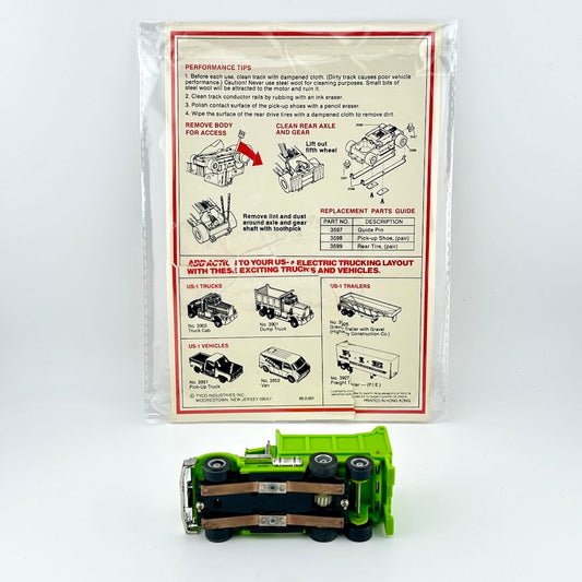 Model truck with a detailed instruction sheet on a white background