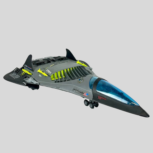 Toy model of a futuristic spacecraft on a white surface