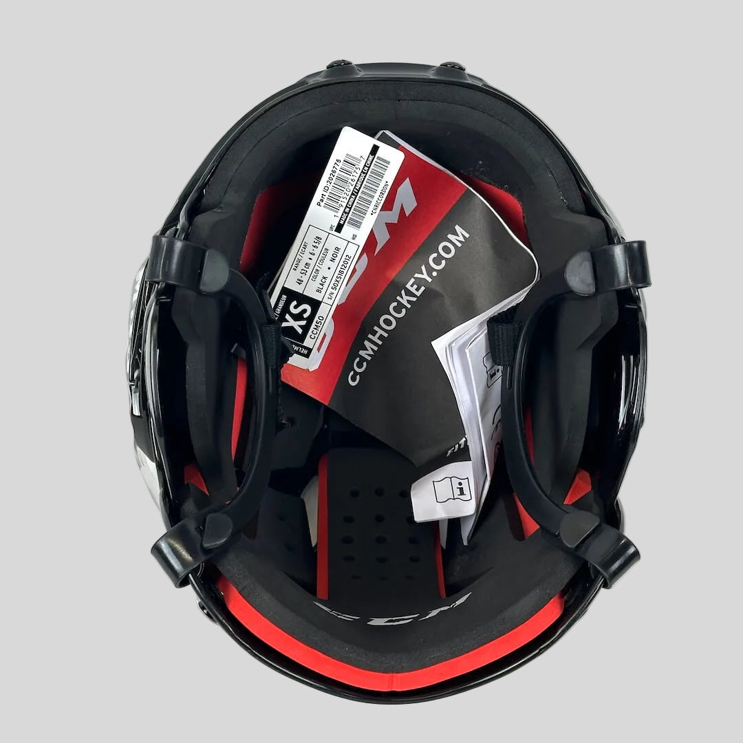 Hockey helmet with a tag on a white background