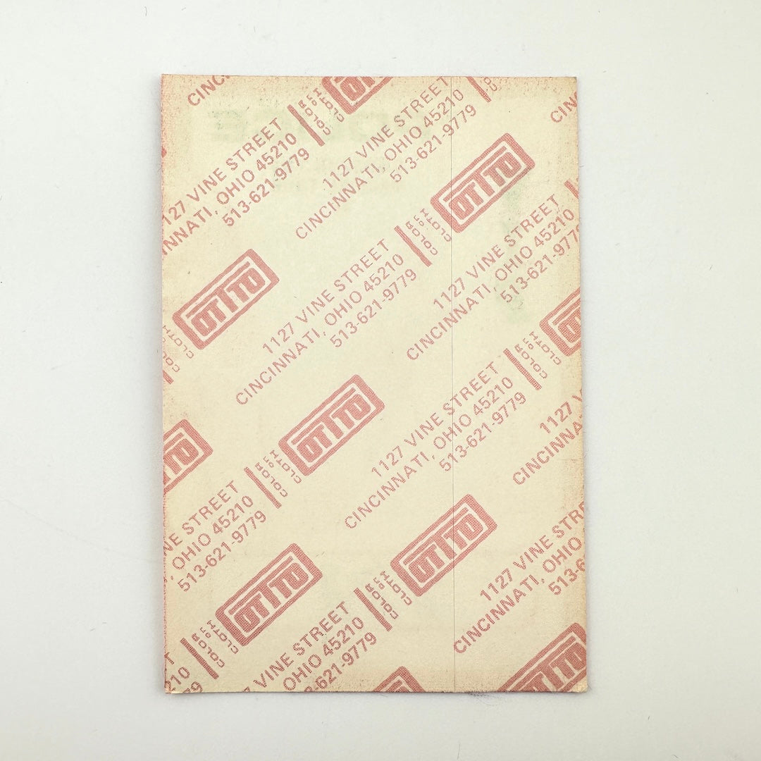 Backside of pass showing intact paper backing and mint condition.