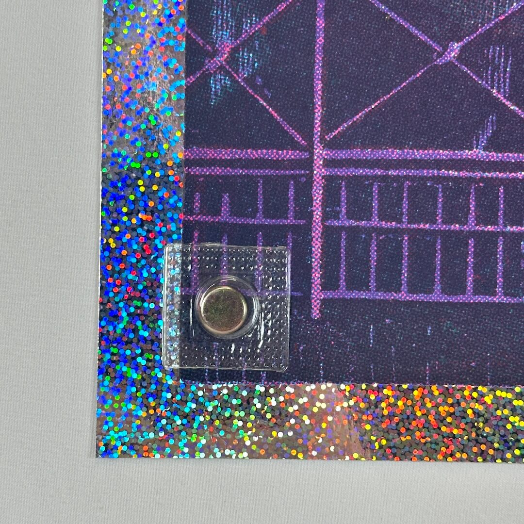 Bottom left corner of poster showing no damage to face, corner or edges.