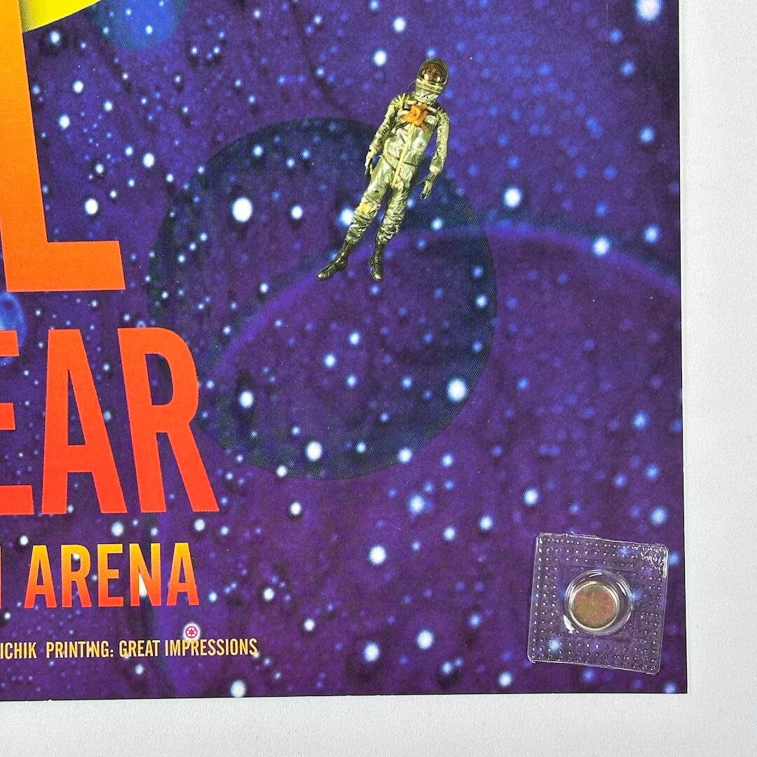Bottom right corner showing clean edges and crisp corner. Drifting astronaut seen among stars.