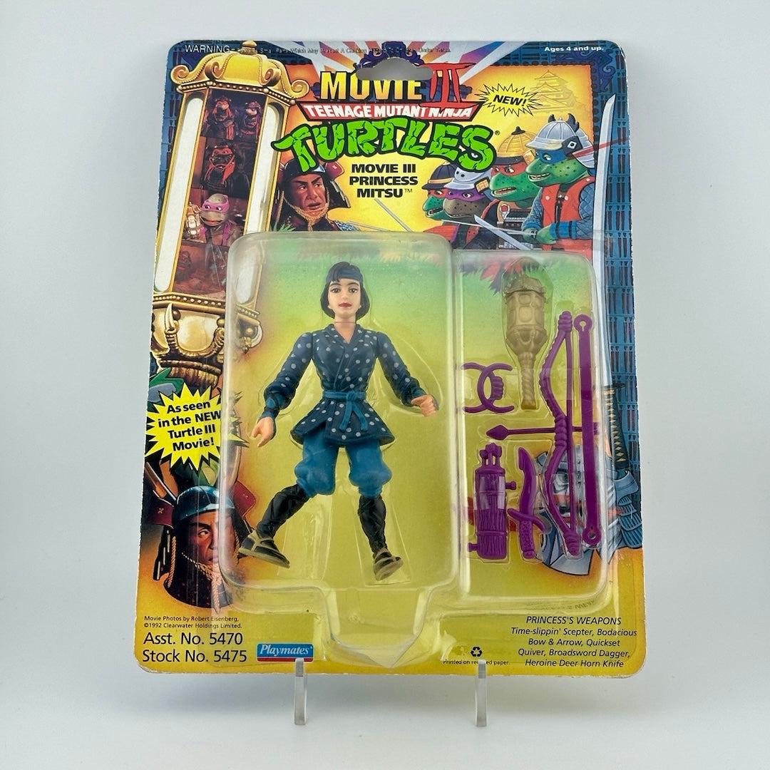 Still sealed action figure of woman in blue, Asian style outfit with purple accessories. Front view.