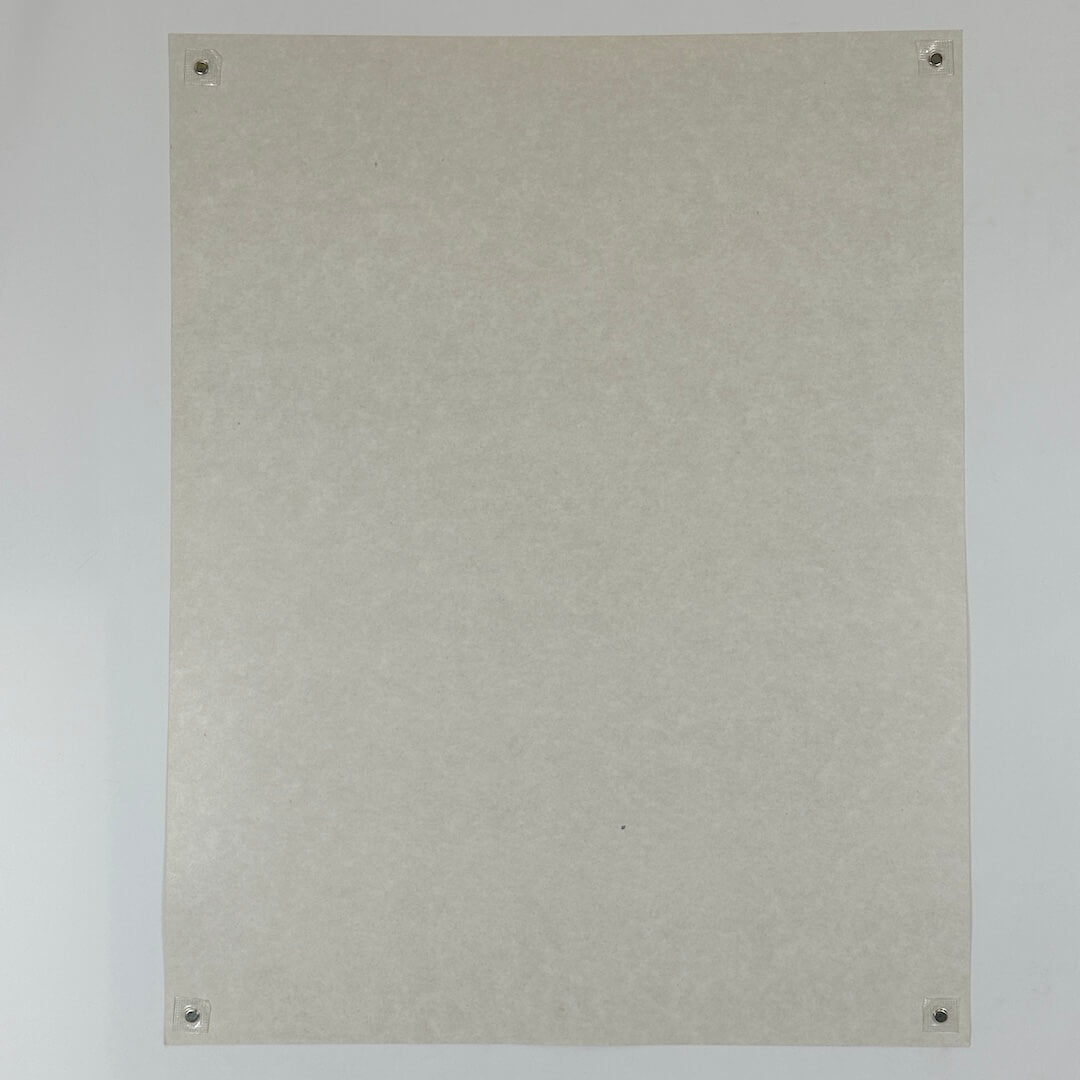 Backside of poster to show textured paper and no visible damage.