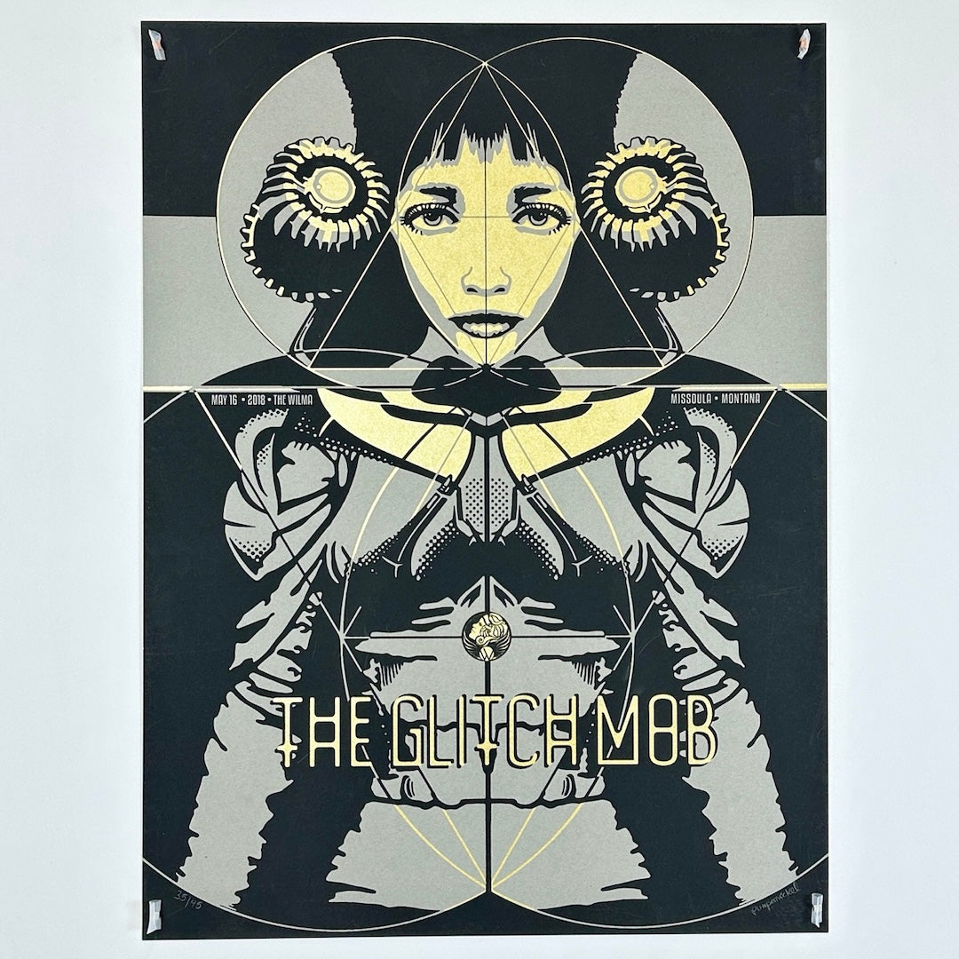 Black poster with woman with gold face wearing gray clothes. Band, venue, and date in gold writing.
